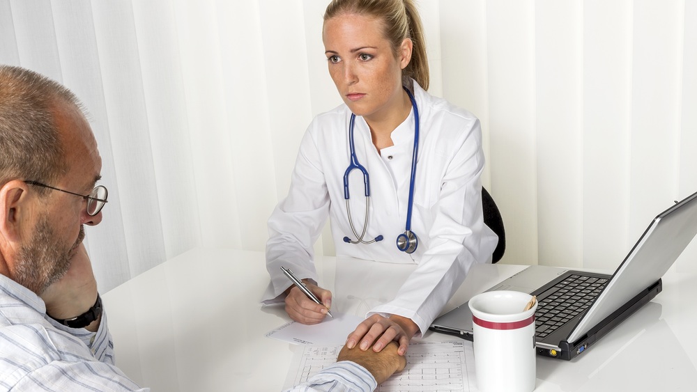 Patient und Ärztin im Gespräch / Erwin Wodicka Patient und Ärztin im Gespräch